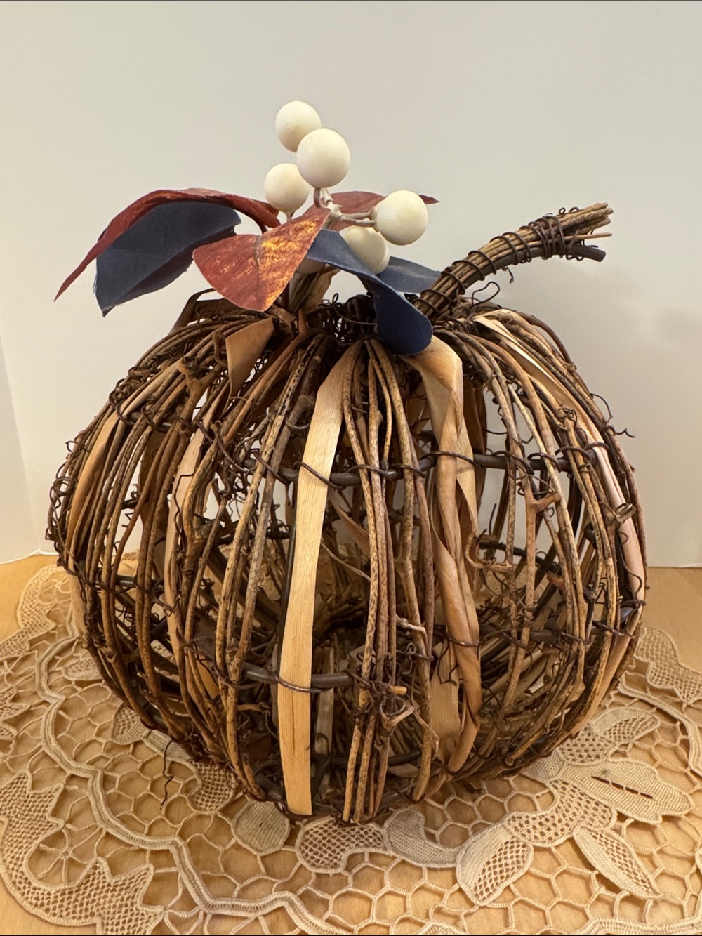 Natural twig and rattan holiday pumpkin tabletop decor